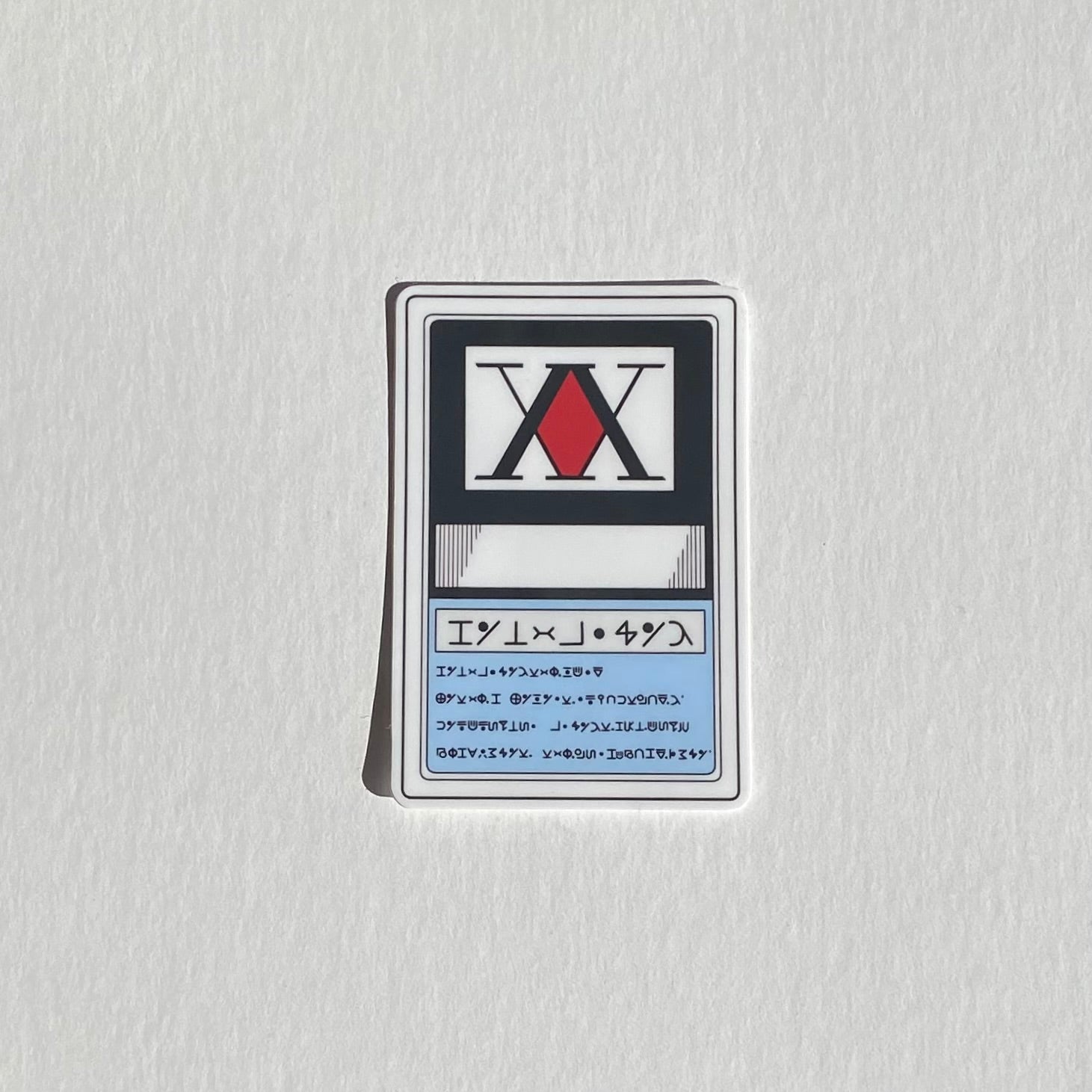 Hunter x Hunter merch. Hunter license sticker. White background.